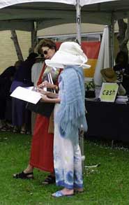 (two ladies and a hat)